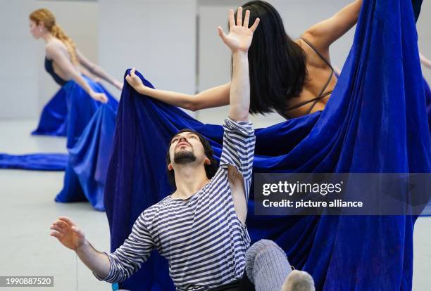 February 2024, Hamburg: Dancer Alexandr Trusch as Odysseus dances during the rehearsal for "Odyssey" in the Ballet Hall at the Ballet Center Hamburg....