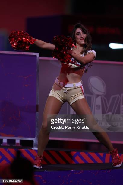 San Francisco 49ers cheerleader performs during Super Bowl LVIII Opening Night at Allegiant Stadium on February 5, 2024 in Las Vegas, NV.