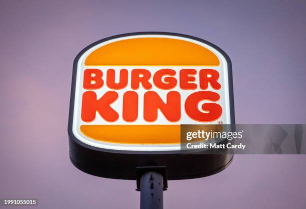 The sun shines on the logo of Burger King at branch of the fast food restaurant, on December 15, 2023 in Bristol, England. Founded in 1953 Burger...