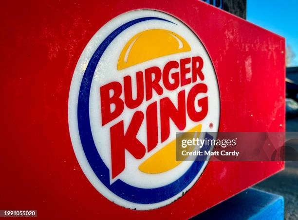 The sun shines on the logo of Burger King at branch of the fast food restaurant, on February 17, 2024 in Ilminster, England. Founded in 1953 Burger...