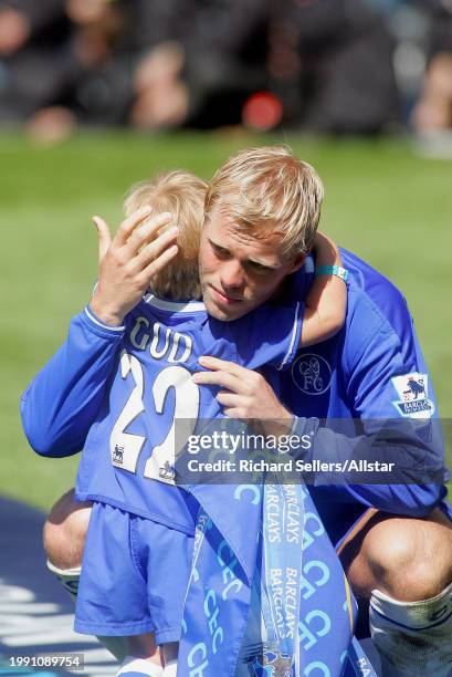 May 7: Eidur Gudjohnsen of Chelsea celebrates with Son after winning 2004-2005 Championship after the Premier League match between Chelsea and...