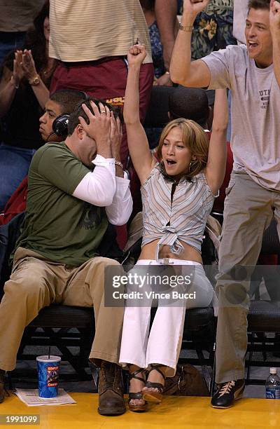 Actor Ben Affleck and his fiance actress/singer Jennifer Lopez attend the Los Angeles Lakers v. San Antonio Spurs playoff game at the Staples Center...