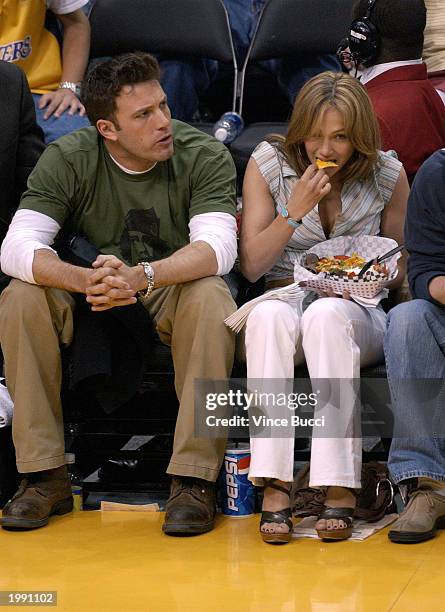 Actor Ben Affleck and his fiance actress/singer Jennifer Lopez attend the Los Angeles Lakers v. San Antonio Spurs playoff game at the Staples Center...