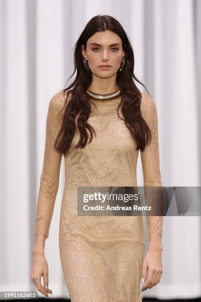 Celine Bethmann walks the runway at the Marc Cain Fashion Show at Arena Berlin on February 06, 2024 in Berlin, Germany.