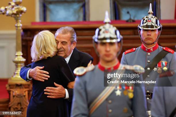 Former president of Chile Eduardo Frei embraces Cecilia Morel during the state funeral for former Chilean president Sebastian Piñera at the former...