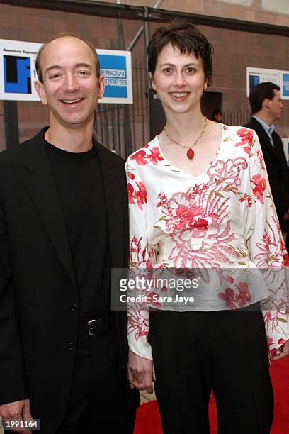 Amazon.com CEO Jeff Bezos and his wife Mackenzie Bezos arrive at the premiere of "The Italian Job" at the Tribeca Performing Arts Center as part of...
