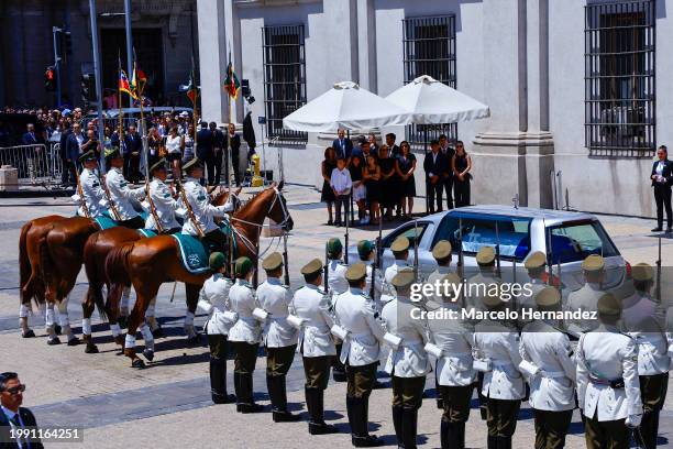 Cecilia Morel alongside her children and grandchildren await the hearse carrying former president Sebastian Piñera at La Moneda palace during the...