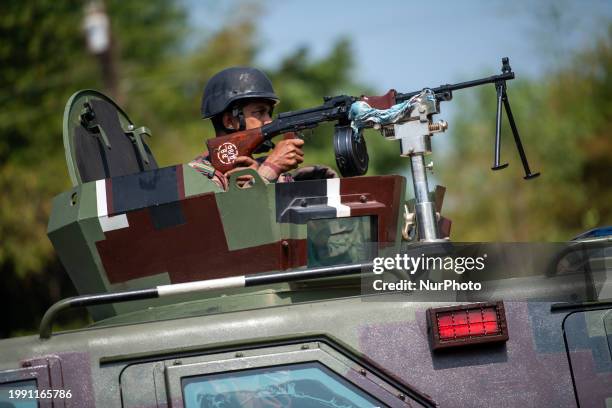 Border Guard Bangladesh personnel are patrolling near the Ghumdum border area in Bandarban district, Bangladesh, on February 8, 2024.