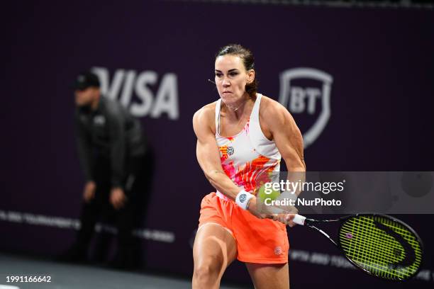 Nuria Parrizas-Diaz of Spain is in action during her match against Harriet Dart of England in the quarterfinals of the Transylvania Open, a WTA250...