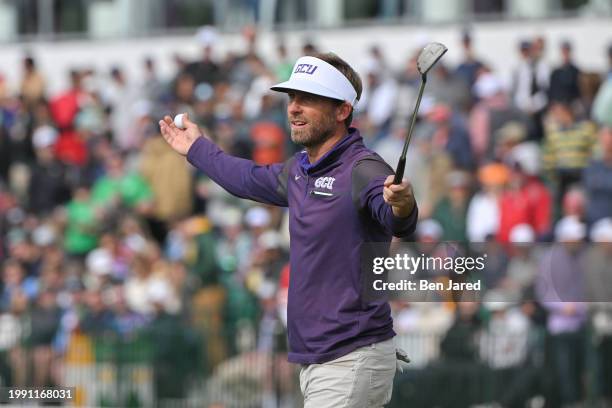 Jesse Mueller reacts to his putt on the 16th green during the continuation of the first round of WM Phoenix Open at TPC Scottsdale on February 9,...