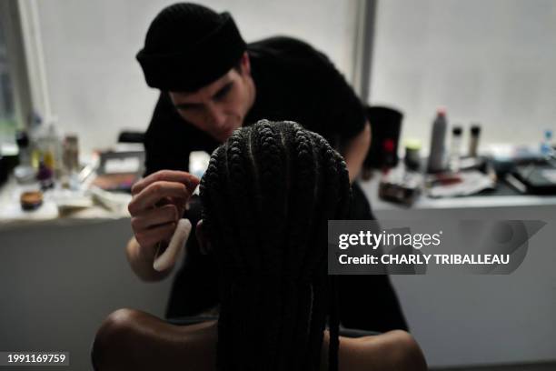 Models get prepared backstage before the presentation of the brand "The Salting" during New York Fashion Week in New York City on February 9, 2024.