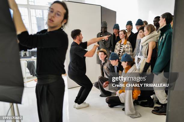 Models get prepared backstage before the presentation of the brand "The Salting" during New York Fashion Week in New York City on February 9, 2024.