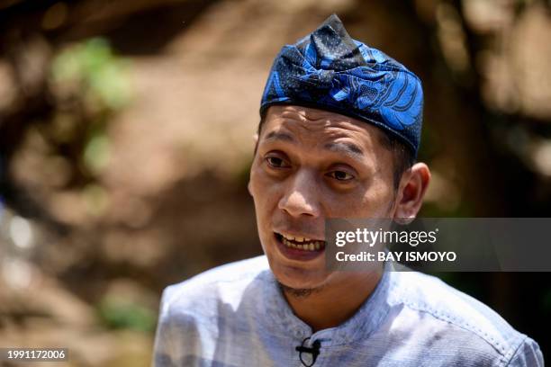 This picture taken on January 25, 2024 shows Agus, the Baduy Kanekes village secretary, speaking during an interview with AFP in Kanekes village in...