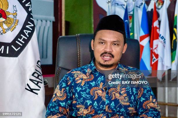 This picture taken on January 26, 2024 shows Ni'matullah, chairman of the Lebak district Election Commission, speaking during an interview by AFP in...