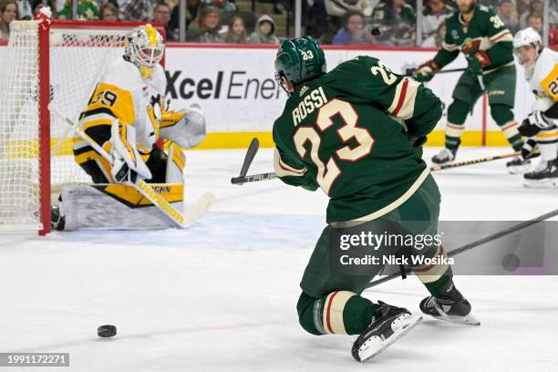 Marco Rossi of the Minnesota Wild breaks his stick on a one-timer attempt against the Pittsburgh Penguins during the first period at Excel Energy...