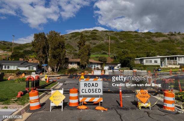 Rancho Palos Verdes, CA The road is closed to traffic on Exultant Dr. Where land movement exacerbated by recent storms has caused large cracks in...