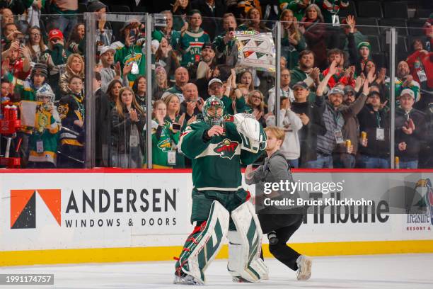 Marc-Andre Fleury of the Minnesota Wild celebrates after defeating the Pittsburgh Penguins and being named the first star at the Xcel Energy Center...