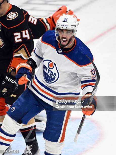 Edmonton Oilers left wing Evander Kane reacts after scoring a goal in the third period of an NHL hockey game against the Anaheim Ducks played on...