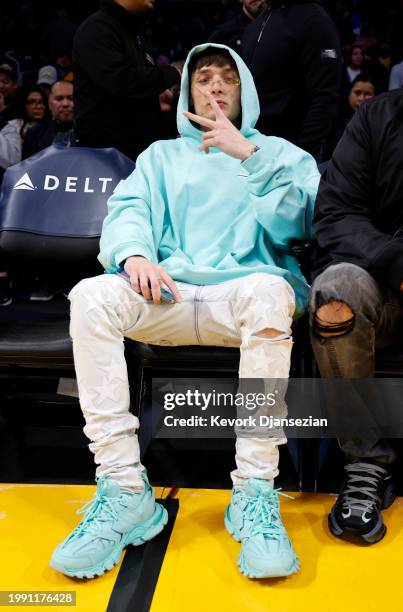 Mexican singer Peso Pluma attends the basketball game between the Los Angeles Lakers and the New Orleans Pelicans at Crypto.com Arena on February 9,...