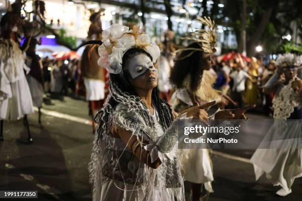 The Afro Ilu Oba de Min block is parading during the street carnival, starting at Praca da Republica in the central region of Sao Paulo, on February...