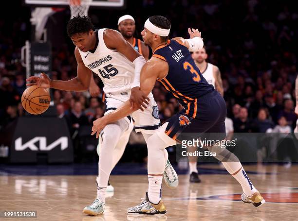 Jackson of the Memphis Grizzlies tries to get past Josh Hart of the New York Knicks in the second half at Madison Square Garden on February 06, 2024...