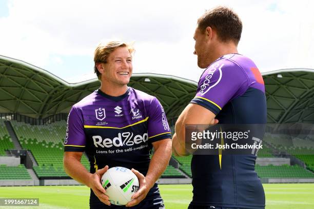 Harry Grant and Cameron Munster of the Storm chat during a Melbourne Storm NRL captaincy announcement at AAMI Park on February 07, 2024 in Melbourne,...