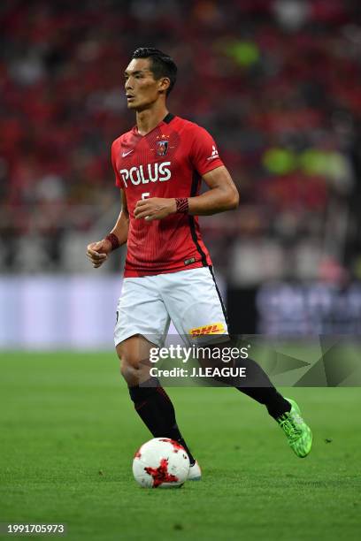 Tomoaki Makino of Urawa Red Diamonds in action during the J.League J1 match between Urawa Red Diamonds and Albirex Niigata at Saitama Stadium on July...