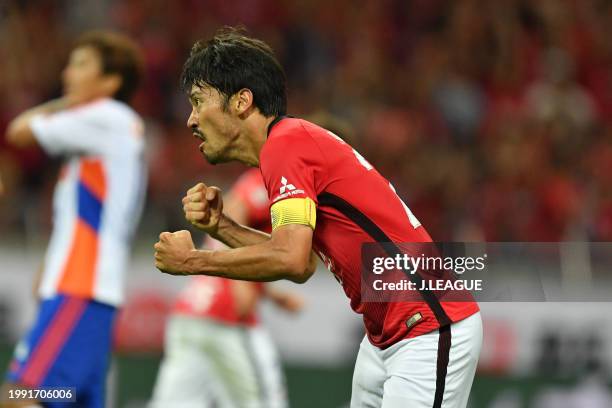 Yuki Abe of Urawa Red Diamonds celebrates after scoring the team's first goal during the J.League J1 match between Urawa Red Diamonds and Albirex...