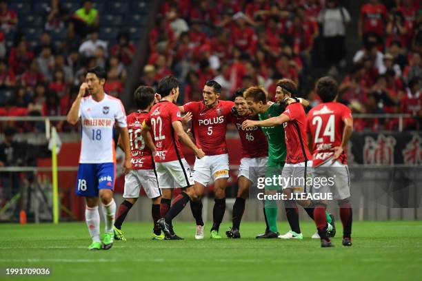 Urawa Red Diamonds players celebrate the team's 2-1 victory in the J.League J1 match between Urawa Red Diamonds and Albirex Niigata at Saitama...