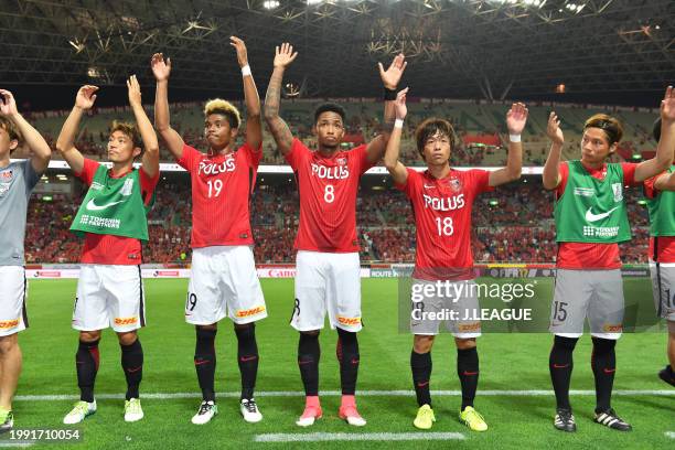 Urawa Red Diamonds players applaud fans after the team's 2-1 victory in the J.League J1 match between Urawa Red Diamonds and Albirex Niigata at...