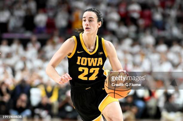 Caitlin Clark of the Iowa Hawkeyes handles the ball against the Maryland Terrapins at Xfinity Center on February 03, 2024 in College Park, Maryland.