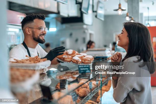 donut delights at the local bakery - croissant doughnut stock pictures, royalty-free photos & images