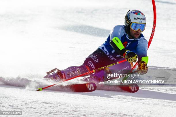 Italy's Luca de Aliprandini competes in the first run of the Men's Giant Slalom event during the FIS Alpine Ski World Cup in Bansko, on February 10,...