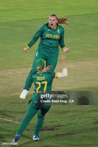 Eliz-Mari Marx of South Africa celebrates with team mates after taking the wicket of Annabel Sutherland of Australia during game two of the Women's...