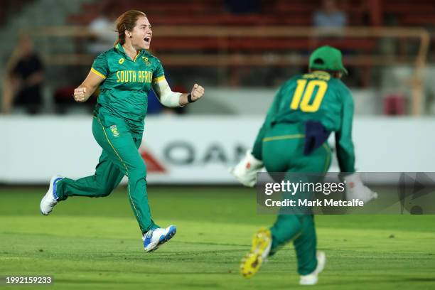 Nadine de Klerk of South Africa celebrates taking the wicket of Tahlia McGrath of Australia during game two of the Women's One Day International...