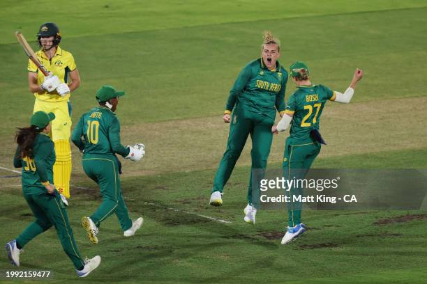 Eliz-Mari Marx of South Africa celebrates with team mates after taking the wicket of Annabel Sutherland of Australia during game two of the Women's...