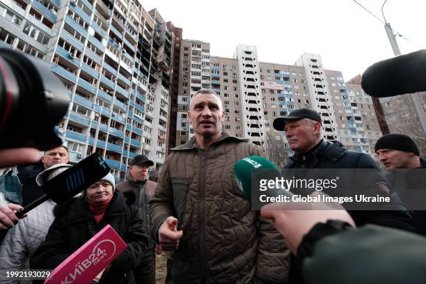 Mayor of Kyiv Vitali Klitschko talks to journalists near a damaged apartment building after a Russian missile attack on February 07, 2024 in Kyiv,...