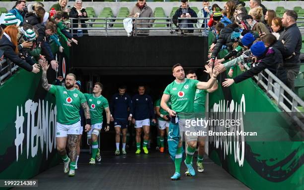 Dublin , Ireland - 10 February 2024; Andrew Porter, left, and Jack Conan high five supporters before an Ireland Rugby captain's run at the Aviva...