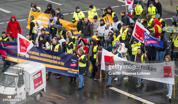 Striking Lufthansa ground crew employees gather at the Lufthansa Aviation Center and walk to Terminal 1 of the Frankfurt Airport during a one-day...