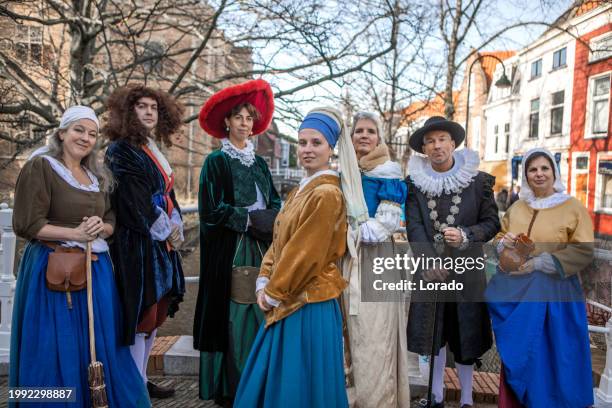 a group of traditional tourist guides in delft - renaissance stockfoto's en -beelden