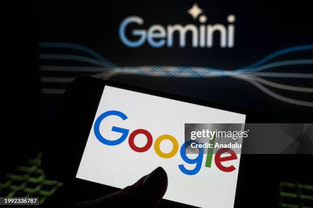 In this photo illustration the logo of 'Google' is displayed on a tablet screen in front of a 'Google Gemini' logo in Ankara, Turkiye on February 10,...