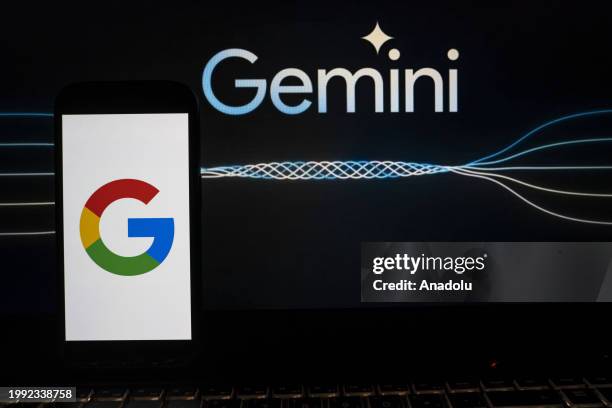 In this photo illustration the logo of 'Google' is displayed on a phone screen in front of a 'Google Gemini' logo in Ankara, Turkiye on February 10,...