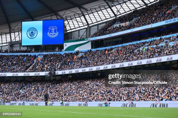 General view of the club crests on the big screen during the Premier League match between Manchester City and Everton FC at Etihad Stadium on...