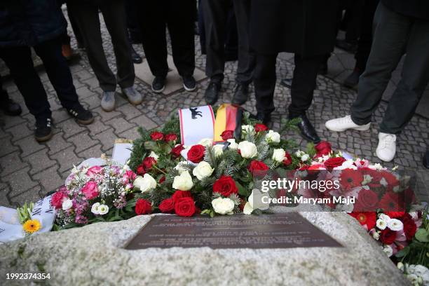 People pay their respects at the memorial for "honour-killing" victim Hatun Surucu on the 19th anniversary of her death on February 07, 2024 in...