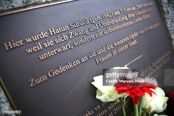 Flowers are left at the memorial for "honour-killing" victim Hatun Surucu on the 19th anniversary of her death on February 07, 2024 in Berlin,...