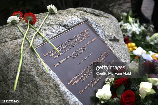 Flowers are left at the memorial for "honour-killing" victim Hatun Surucu on the 19th anniversary of her death on February 07, 2024 in Berlin,...