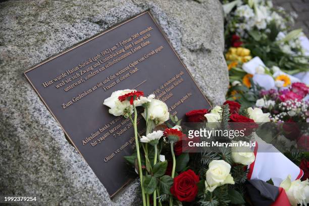 Flowers are left at the memorial for "honour-killing" victim Hatun Surucu on the 19th anniversary of her death on February 07, 2024 in Berlin,...