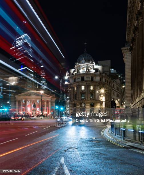 city street at night with light trails - vehicle light stock pictures, royalty-free photos & images