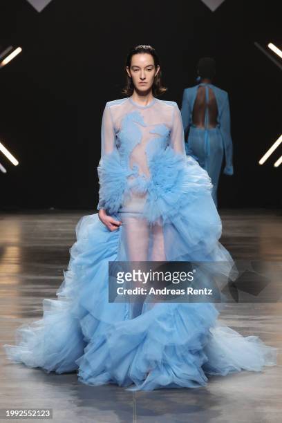 Model walks the runway during the Danny Reinke Runway Show as part of the W.E4. Fashion Day during Berlin Fashion Week AW24 at Verti Music Hall on...