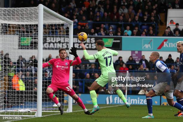 Andi Weimann of West Bromwich Albion is judged to have handled the ball as he bundles it into the goal, which was ruled out and he received a yellow...